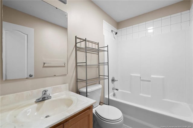 full bathroom featuring toilet, shower / washtub combination, and vanity