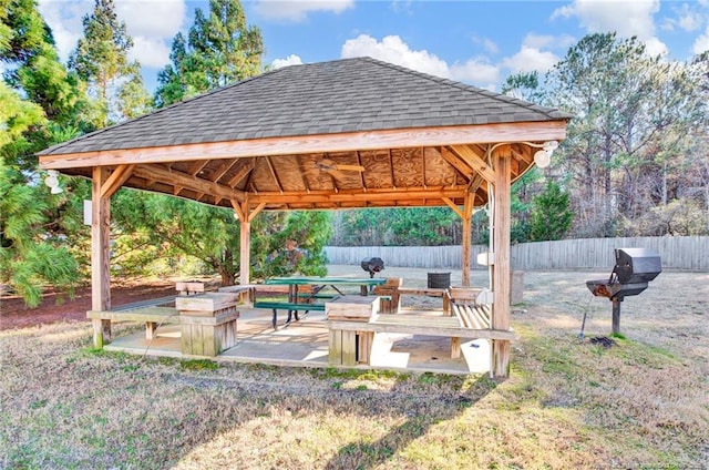 view of patio / terrace featuring fence and a gazebo