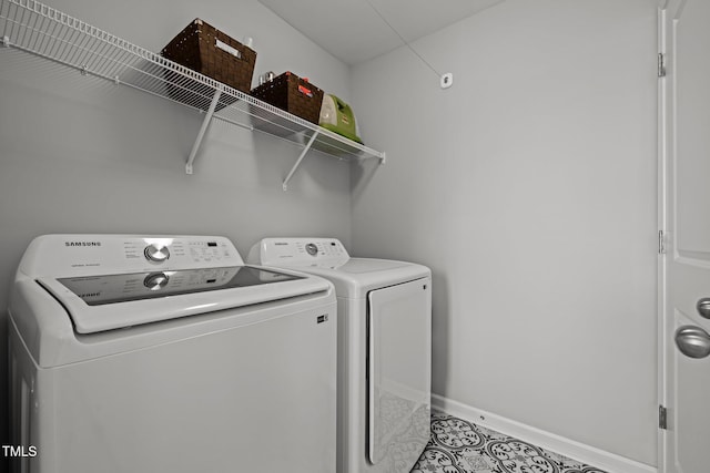 350 Arlie Ln, Lillington, NC 27546 - washroom featuring washer and dryer and baseboards
