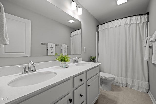 350 Arlie Ln, Lillington, NC 27546 - full bath with toilet, double vanity, tile patterned flooring, and a shower with shower curtain