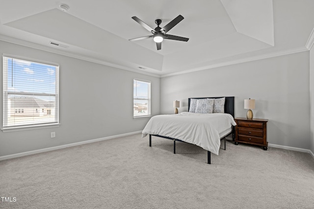 350 Arlie Ln, Lillington, NC 27546 - bedroom with a tray ceiling, crown molding, baseboards, and light colored carpet