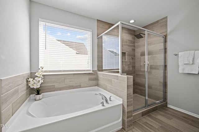350 Arlie Ln, Lillington, NC 27546 - full bathroom with a garden tub, a stall shower, wood finished floors, and recessed lighting