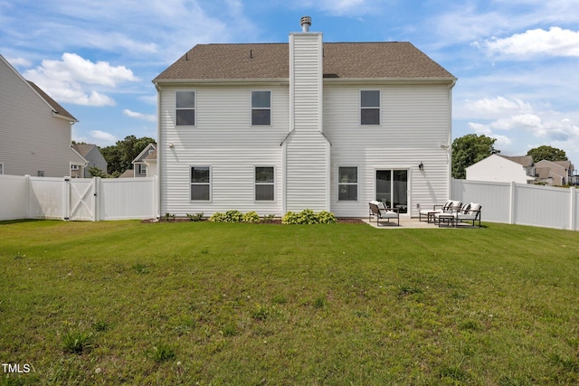 350 Arlie Ln, Lillington, NC 27546 - back of house with a patio area, a chimney, and a gate