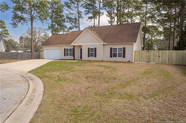 ranch-style house with a garage, a front yard, concrete driveway, and fence