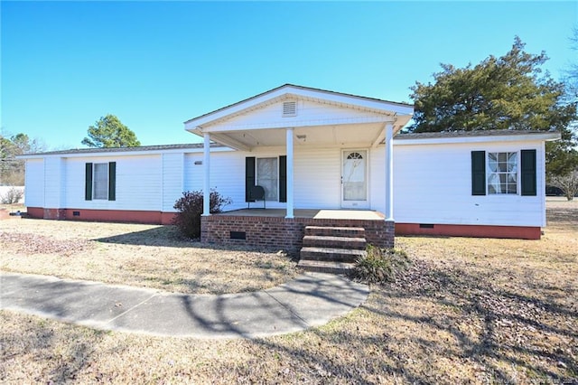 view of front of property with crawl space and covered porch