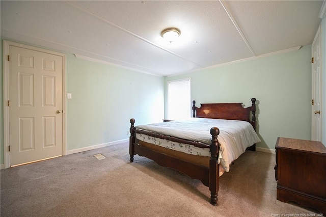 carpeted bedroom with baseboards