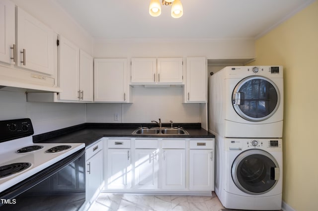 laundry room featuring laundry area, stacked washer / dryer, marble finish floor, crown molding, and a sink