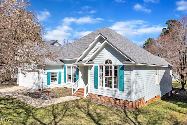 view of front facade featuring an attached garage, concrete driveway, crawl space, roof with shingles, and a front yard