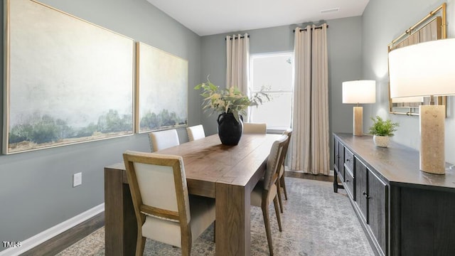 150 Ethel Ln, Angier, NC 27501 - dining area featuring plenty of natural light and wood finished floors