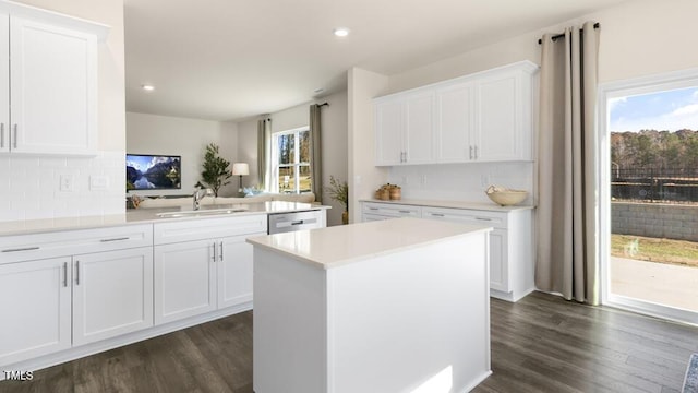 150 Ethel Ln, Angier, NC 27501 - kitchen featuring a sink, decorative backsplash, white cabinetry, light countertops, and recessed lighting