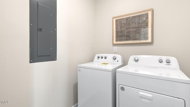 150 Ethel Ln, Angier, NC 27501 - clothes washing area with electric panel and washer and clothes dryer