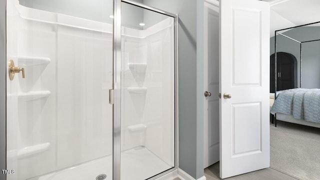 150 Ethel Ln, Angier, NC 27501 - bathroom featuring a shower stall, connected bathroom, and baseboards