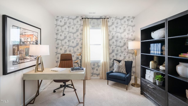 home office with carpet flooring and wallpapered walls