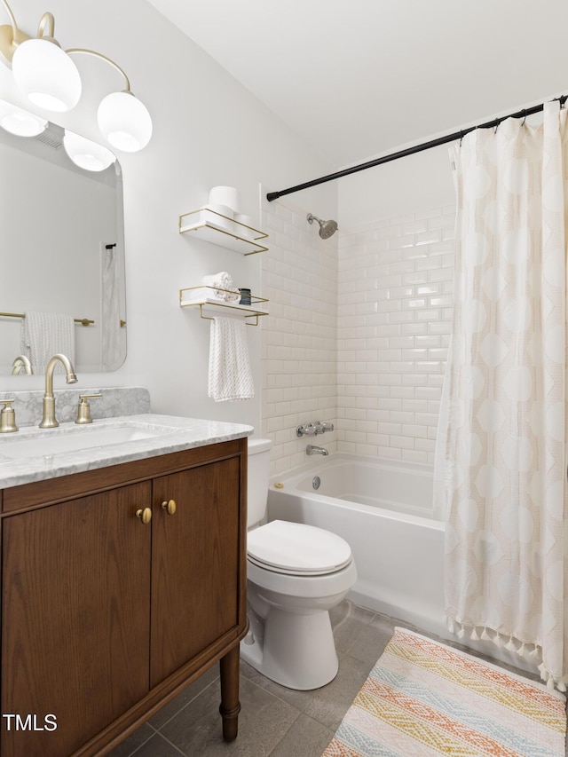 bathroom featuring tile patterned flooring, vanity, toilet, and shower / bath combo