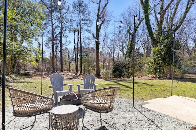 view of patio featuring a fire pit