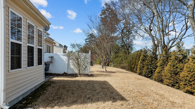 view of yard featuring fence