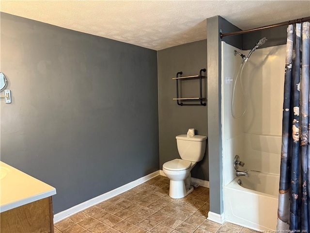 full bathroom with baseboards, toilet, shower / bath combo with shower curtain, a textured ceiling, and vanity