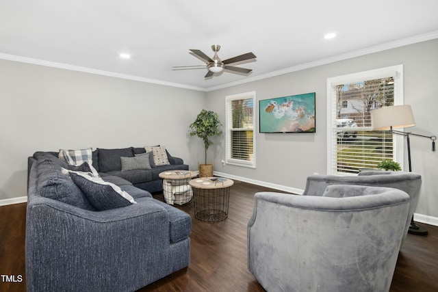 living room with baseboards, dark wood-type flooring, and a healthy amount of sunlight