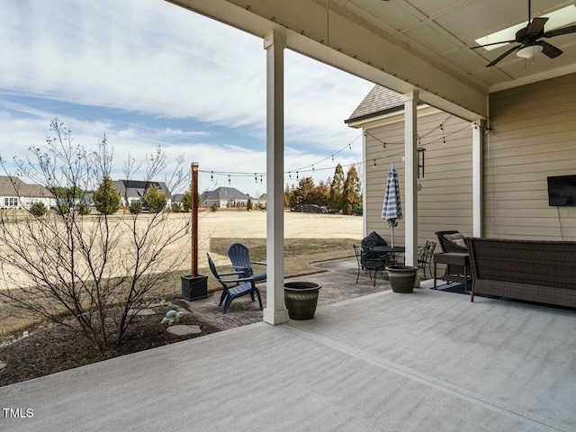 view of patio featuring a ceiling fan