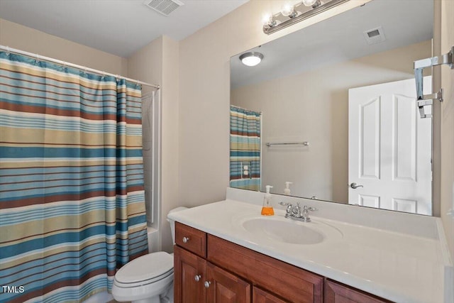 full bathroom featuring toilet, curtained shower, visible vents, and vanity