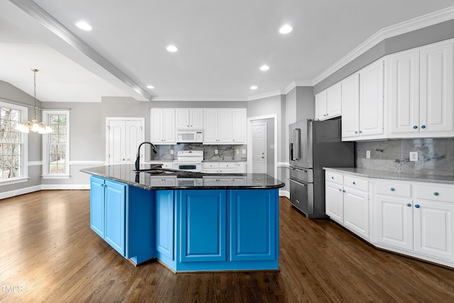 kitchen with a sink, white appliances, dark wood-type flooring, and white cabinets