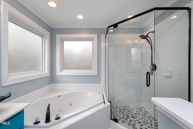 full bath with a jetted tub, ornamental molding, recessed lighting, a stall shower, and vanity