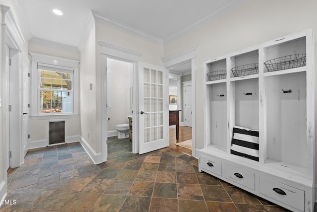 mudroom with baseboards, french doors, stone tile flooring, and ornamental molding