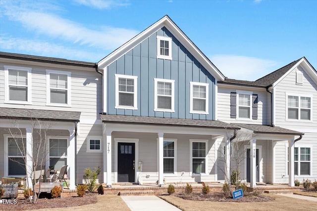 multi unit property featuring covered porch and board and batten siding