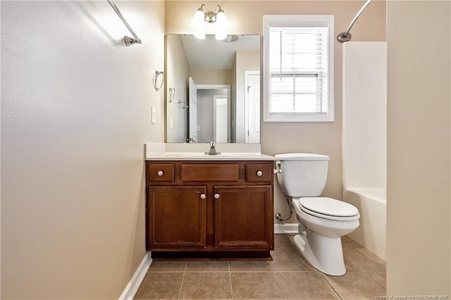 full bathroom with toilet, vanity, baseboards, tub / shower combination, and tile patterned floors