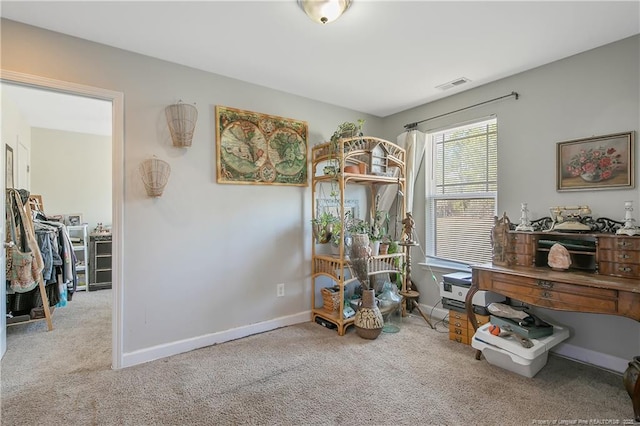 misc room featuring carpet flooring, visible vents, and baseboards