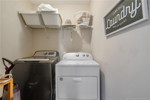 laundry room with laundry area and washer and dryer