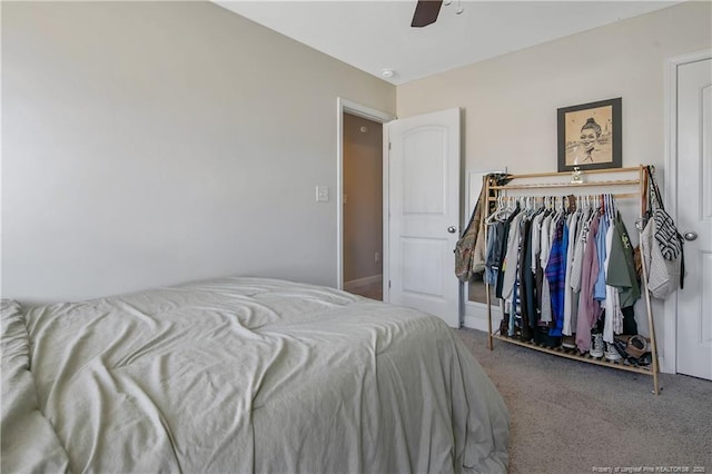 bedroom featuring carpet flooring and a ceiling fan