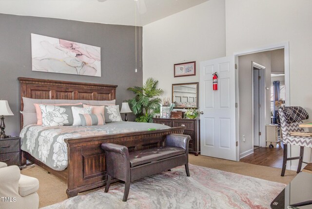 11843 Canemount St, Raleigh, NC 27614 - carpeted bedroom with high vaulted ceiling and baseboards