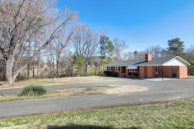 exterior space featuring driveway