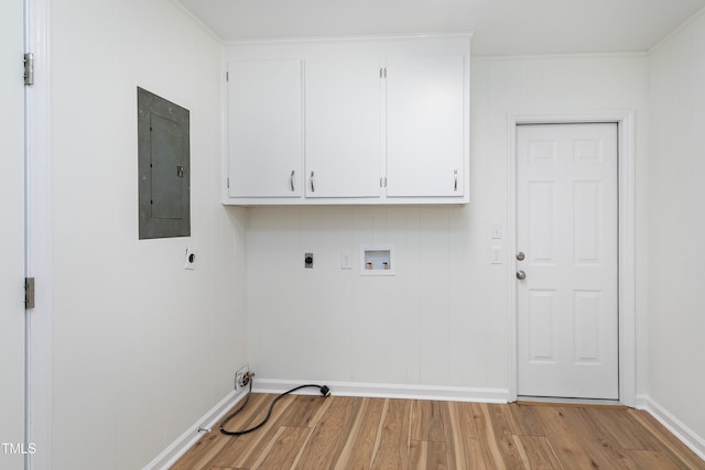 laundry area with hookup for a washing machine, hookup for an electric dryer, light wood-style floors, cabinet space, and electric panel