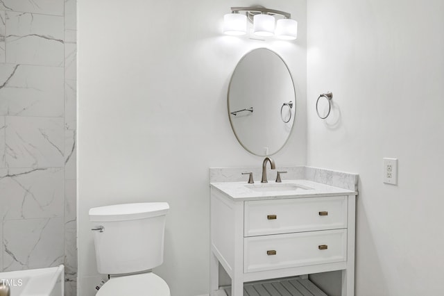 full bath featuring toilet and vanity