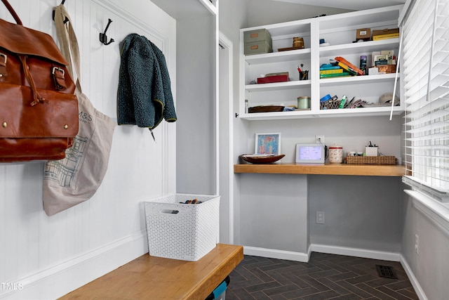 mudroom featuring baseboards and visible vents