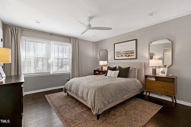 bedroom with baseboards, a ceiling fan, and hardwood / wood-style flooring