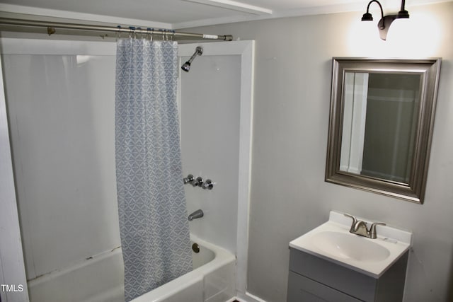 bathroom with shower / tub combo with curtain and vanity