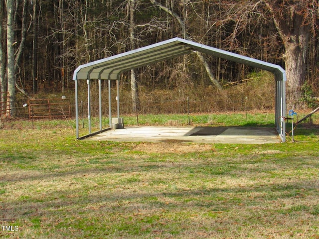 exterior space featuring a carport and a lawn