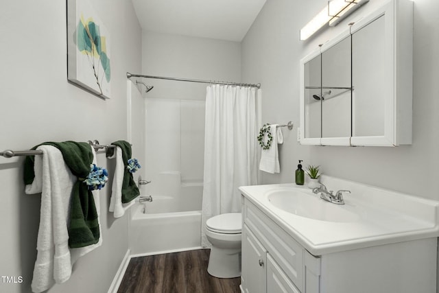 full bathroom featuring shower / bath combo, vanity, toilet, and wood finished floors