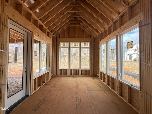 unfurnished sunroom with vaulted ceiling and plenty of natural light