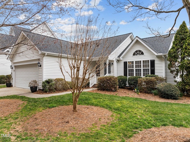 ranch-style home featuring driveway, a front lawn, an attached garage, and a shingled roof