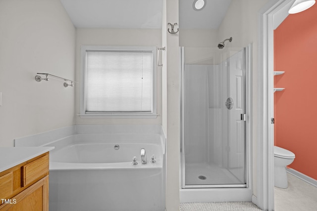 full bathroom with vanity, toilet, a shower stall, tile patterned floors, and a bath