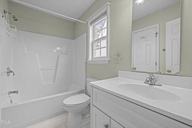 full bath featuring vanity, toilet, tile patterned flooring, and shower / washtub combination