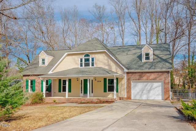 view of front of house featuring covered porch, brick siding, fence, and concrete driveway