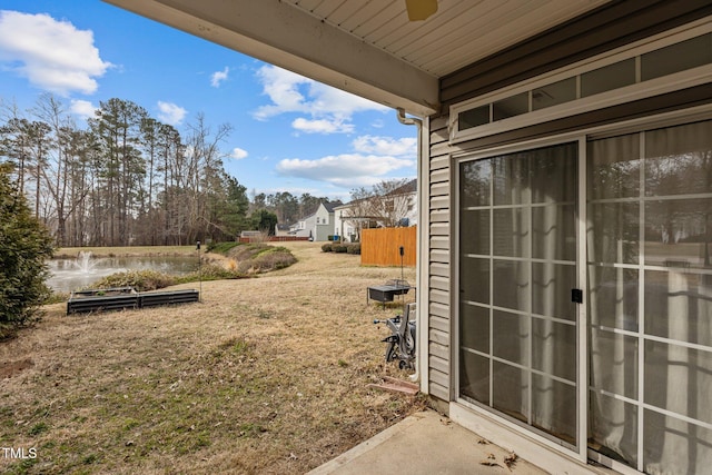 view of yard featuring a ceiling fan