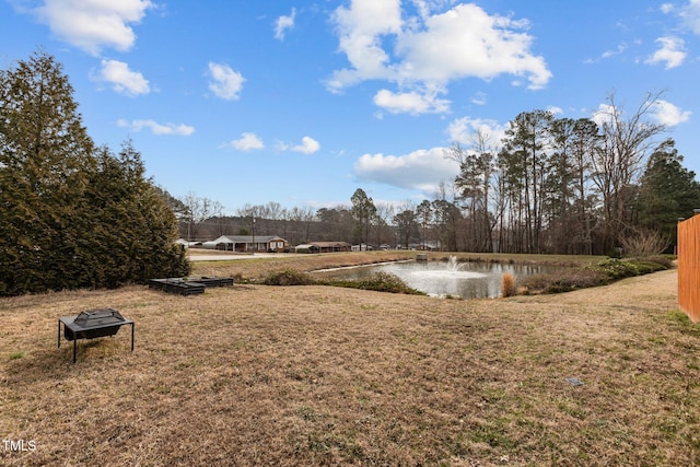 view of yard with a water view