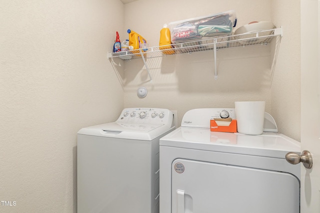 laundry room with laundry area and washing machine and dryer