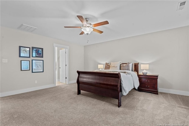 bedroom with carpet, visible vents, and baseboards